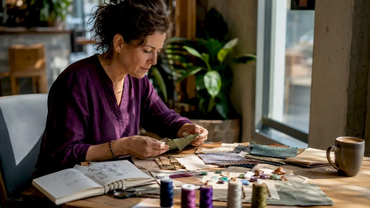 Artisan choosing niche craft materials at home