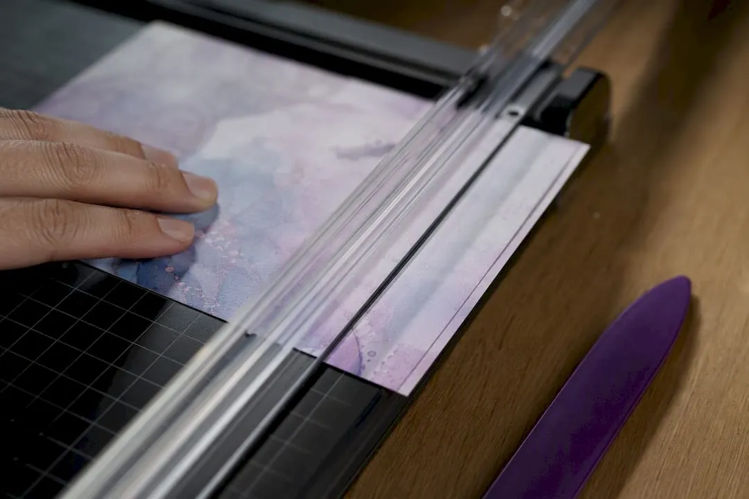 Card panel positioned for borderless trimming